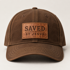 Brown cap with rectangular tan leather-look SAVED BY JESUS patch and curved brim