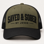 Olive and black trucker hat with embroidered SAVED & SOBER BY JESUS lettering