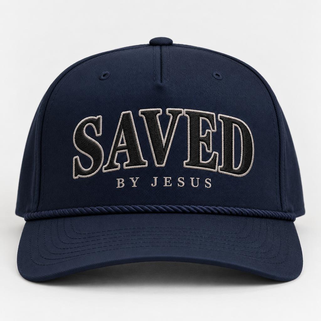 The Saved Heritage Navy rope cap with outlined SAVED embroidery and BY JESUS lettering