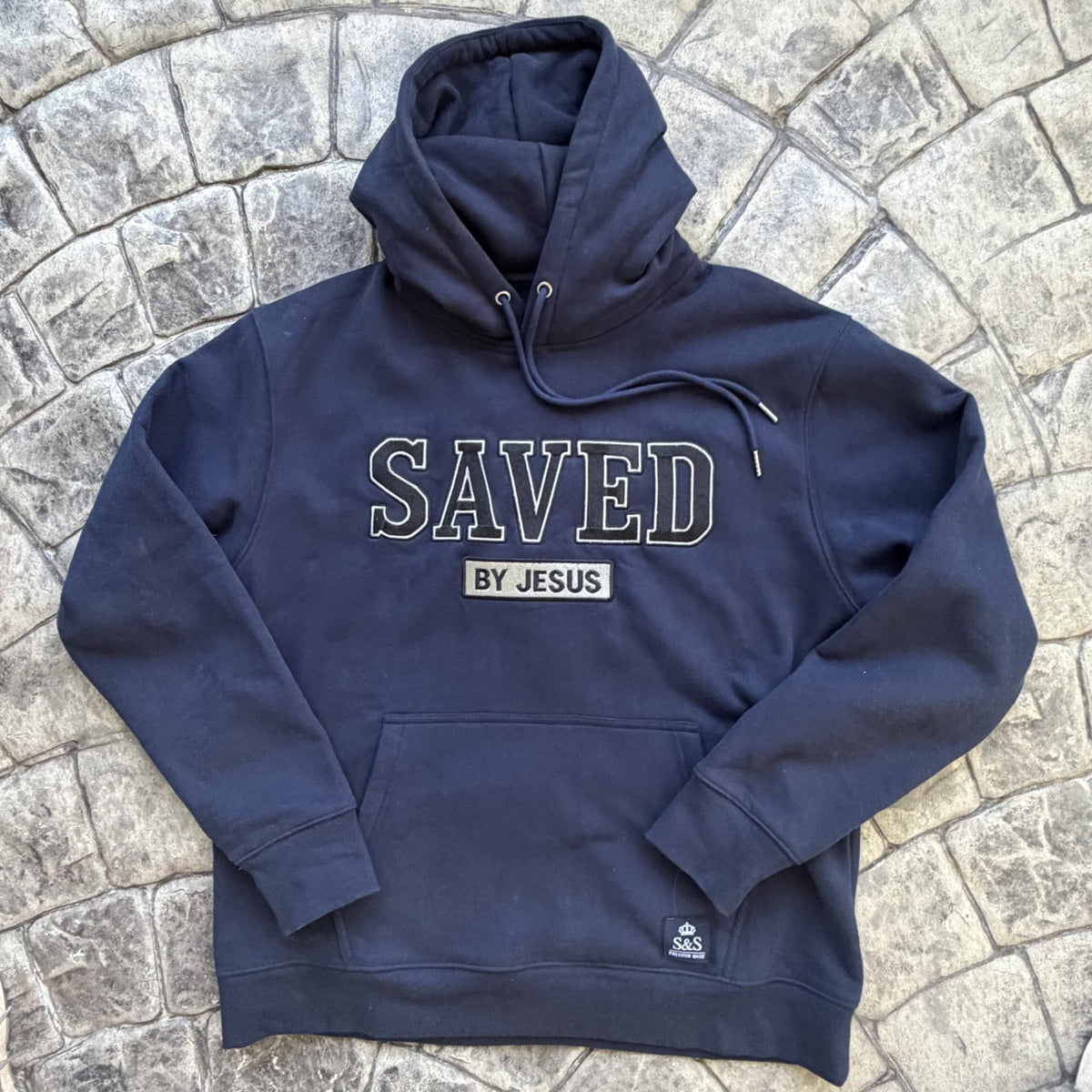 Heritage Navy Saved by Jesus hoodie front with embroidered SAVED and BY JESUS details